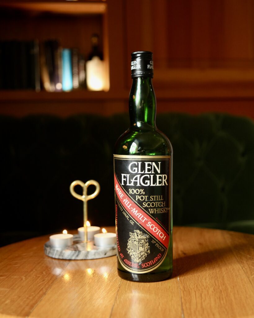 This is a bit of a special and different whisky of the week, this time Glen Flagler. Glen Flagler was set up in the Garnheath’s grain distillery in Airdrie, one of many that was erected inside of a grain facility in the 1960s. The distillery was primarily designed to be used in blends as a compliment to the grain spirit from Garnheath, but you can find a few bottles of this rare single malt floating around. The distillery only produced whisky for 22 years and closed in 1988. This whisky has a slight peat note and is almost like an old leather book in the best way possible. This is a chance to try a very rare and amazing dram. - Calum Diack, Quaich Bar Manager